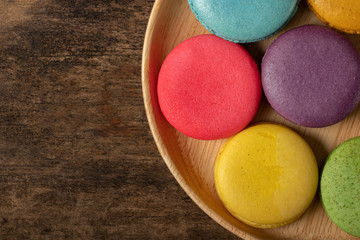 French Colorful Macarons Colorful Macarons on Wood Background