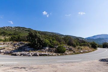 Fototapeta na wymiar empty winding road in scenic mountains, provence, france