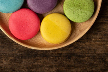 French Colorful Macarons Colorful Macarons on Wood Background