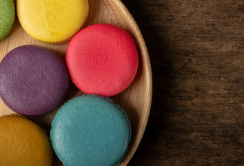 French Colorful Macarons Colorful Macarons on Wood Background