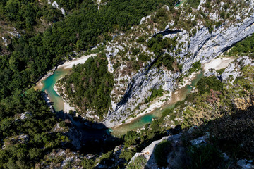 aerial view of rocky mountains and beautiful turquoise verdon river in provence, france