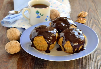 Pumpkin muffins with chocolate glaze