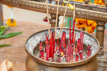 Fototapeta na wymiar close up of Burning red Incense sticks