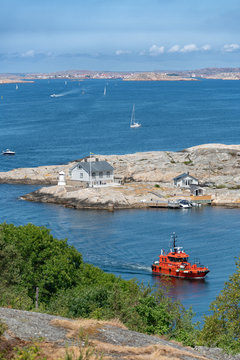 Picture of sea overview with boat on the water and house