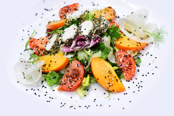 Fresh salad plate with natural greens and tomato with cheese. Natural and healthy vegetable food. You have to eat right for the fat to take flight