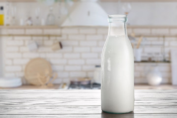 A bottle of milk on the kitchen table