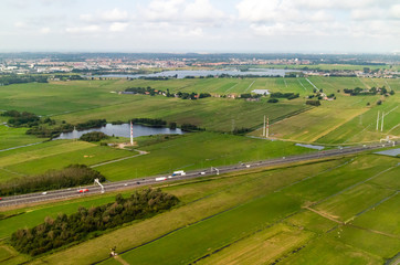Fototapeta na wymiar An aerial view of the fields and flatlands near Amsterdam in the Netherlands