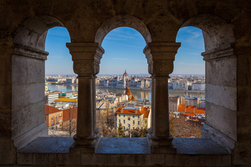 BUDAPEST / HUNGARY - FEBRUARY 02, 2012: Framed panorama of the city, shot taken from window at Fishermans Bastion during winter sunny day