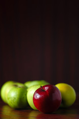 Apples. Red apple on a background of green.
