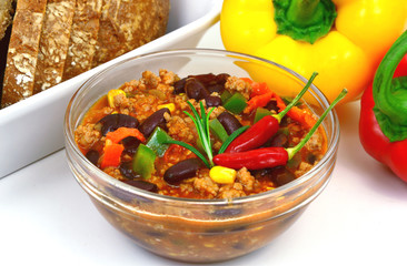 chili with meat or (German name is Chili con carne).
chili,ground pork and red bean and corn menu.