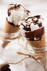 Two cornetto ice cream. Vanilla ice cream on wafle on white background