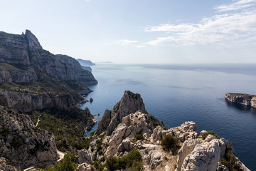 Fototapeta na wymiar Scenic landscape with beautiful calm sea and cliffs in Calanque de Sugiton, Marseille, France