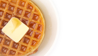Round Waffles Ready for Breakfast on a White Background