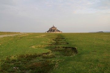 Fototapeta na wymiar France, Le Mont-Saint-Michel, grass, monastery, landscape, field, meadow, green, summer, countryside, hollow, ravine, narrow gully, shallow gully, coomb, comb