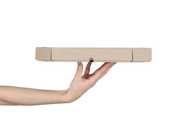 Female hand holding pizza box on white background