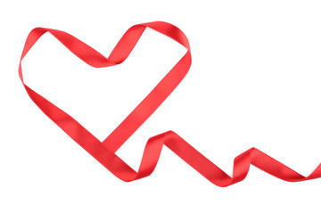 Red ribbon in heart shape isolated on white background