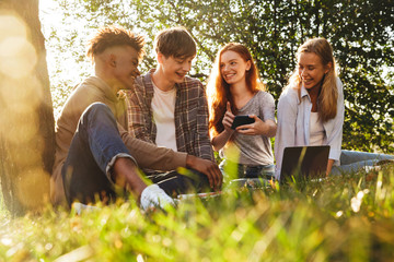 Group of laughing multhiethnic students