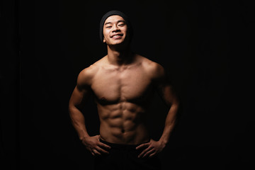Fototapeta na wymiar Portrait of young asian boy with fitness body