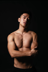 Portrait of young asian boy with fitness body