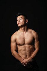 Fototapeta premium Portrait of young asian boy with fitness body