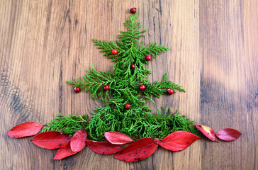 Christmas tree made of pine twigs and blueberry leaves.