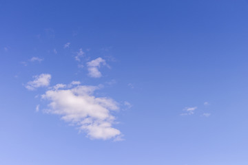 Blue sky and white fluffy tiny clouds background and pattern