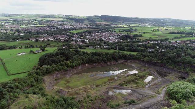 Aerial footage over Kilbarchan Quarry in Renfrewshire, Scotland. 