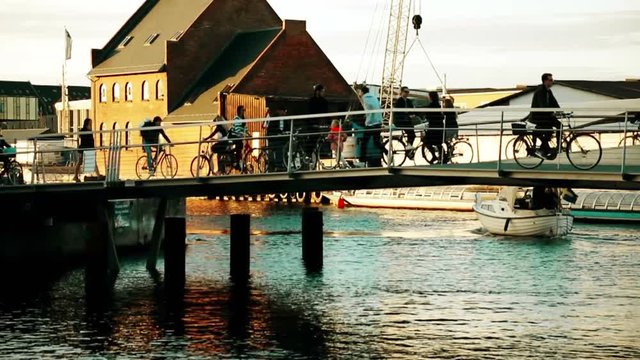 People crossing the bascule bridge sunday afternoon in town canal district