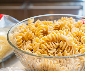 Closeup of Cooked Rotini Pasta in a Glass Bowl