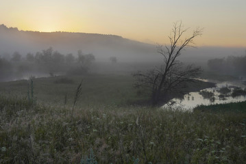 misty morning on the river in the foothills of the Urals