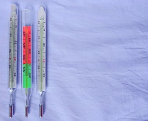 Medicine Medical Health Care Industry Three Thermometers Set Laying On The Clear Soft Light Blue Background With Copy Paste Text Space