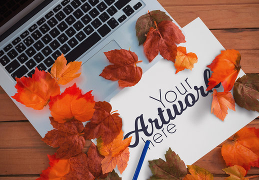 Paper near Laptop Mockup