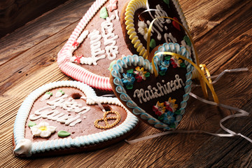 original bavarian Oktoberfest gingerbread heart on wood