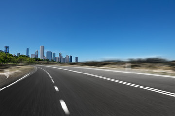 asphalt highway with modern city in chicago