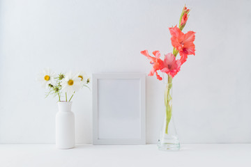 Mockup white frame with pink and white flowers in a vase on a light background