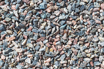 Closeup of crushed gravel in different colors