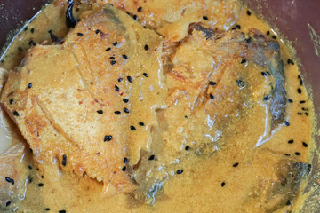 Pomfret fish pieces on a plate.