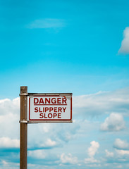 Danger Slippery Slope warning sign on Quayside