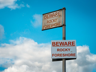 Beware Rocky Foreshore warning sign on Quayside