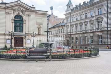 Square with the Polish Theater in Bielsko Biala founded in 1890. A building in the eclectic style with the predominance of neo-classicism and neo-Baroque, using the motif of the Roman triumphal arch. 