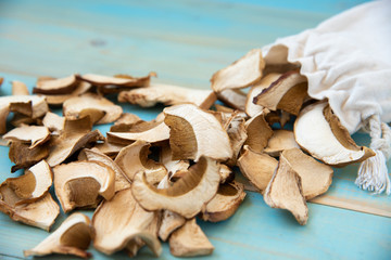 Dried mushrooms, on a blue wooden table