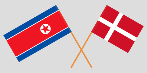 North Korea and Denmark. Crossed Korean and Danish flags. Official colors. Correct proportion. Vector