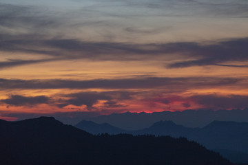 Burning sky over mountains during sunset
