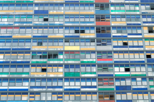 Architectural residential tower with colours on balconies 
