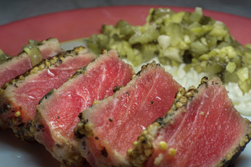 Fried tuna steak with cucumber salad