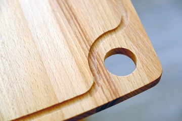 Cutting board. Hanging hole in the kitchen