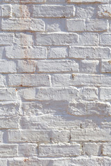 Old brick wall painted white