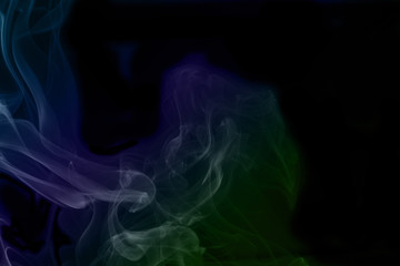 Humo de colores en fondo negro. Sensaciones. Dejar de fumar. Fondo. Texturas.inquietud. tranquilidad