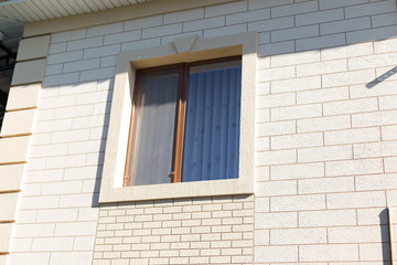 Rough wall texture, wall background, like brickwork, house facade with spatula technology,