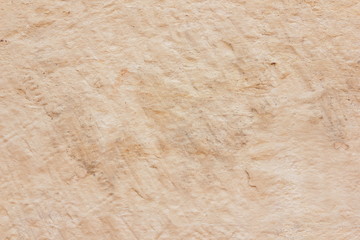 Texture of a stone wall. Vintage background. A wall of medieval buildings. Abstract pattern with a natural material